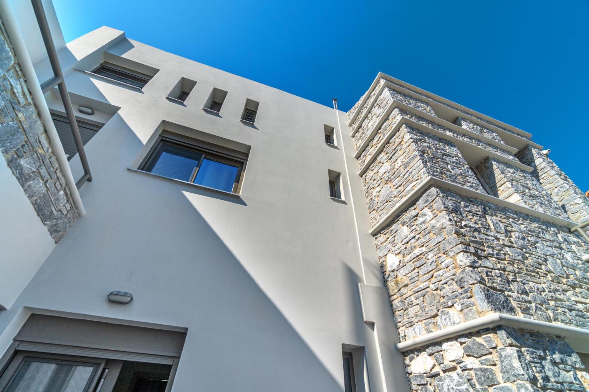 La Perla Suites Агии Апостоли Екстериор снимка
